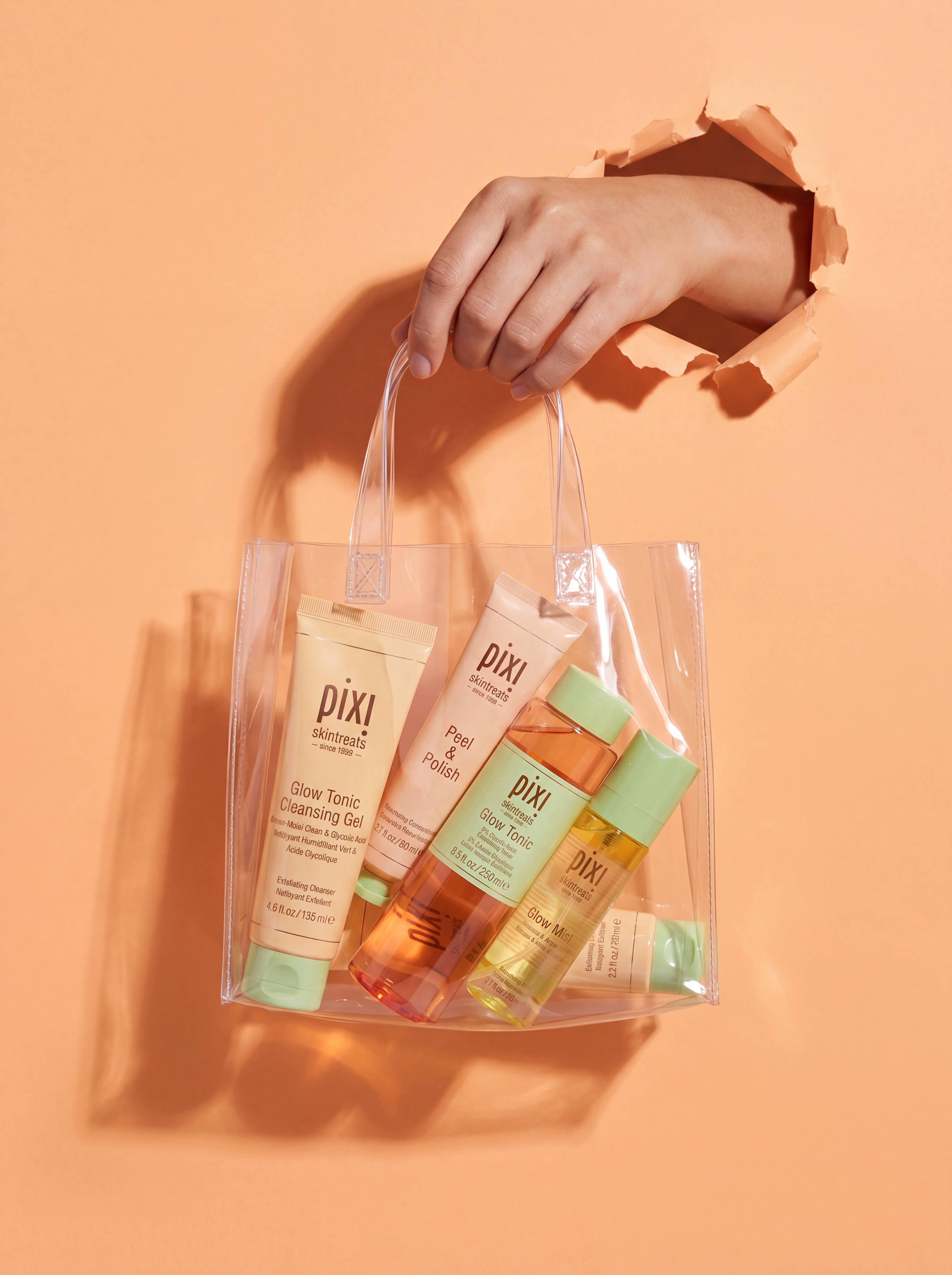 Graphic product campaign still with products arranged in a transparent bag.